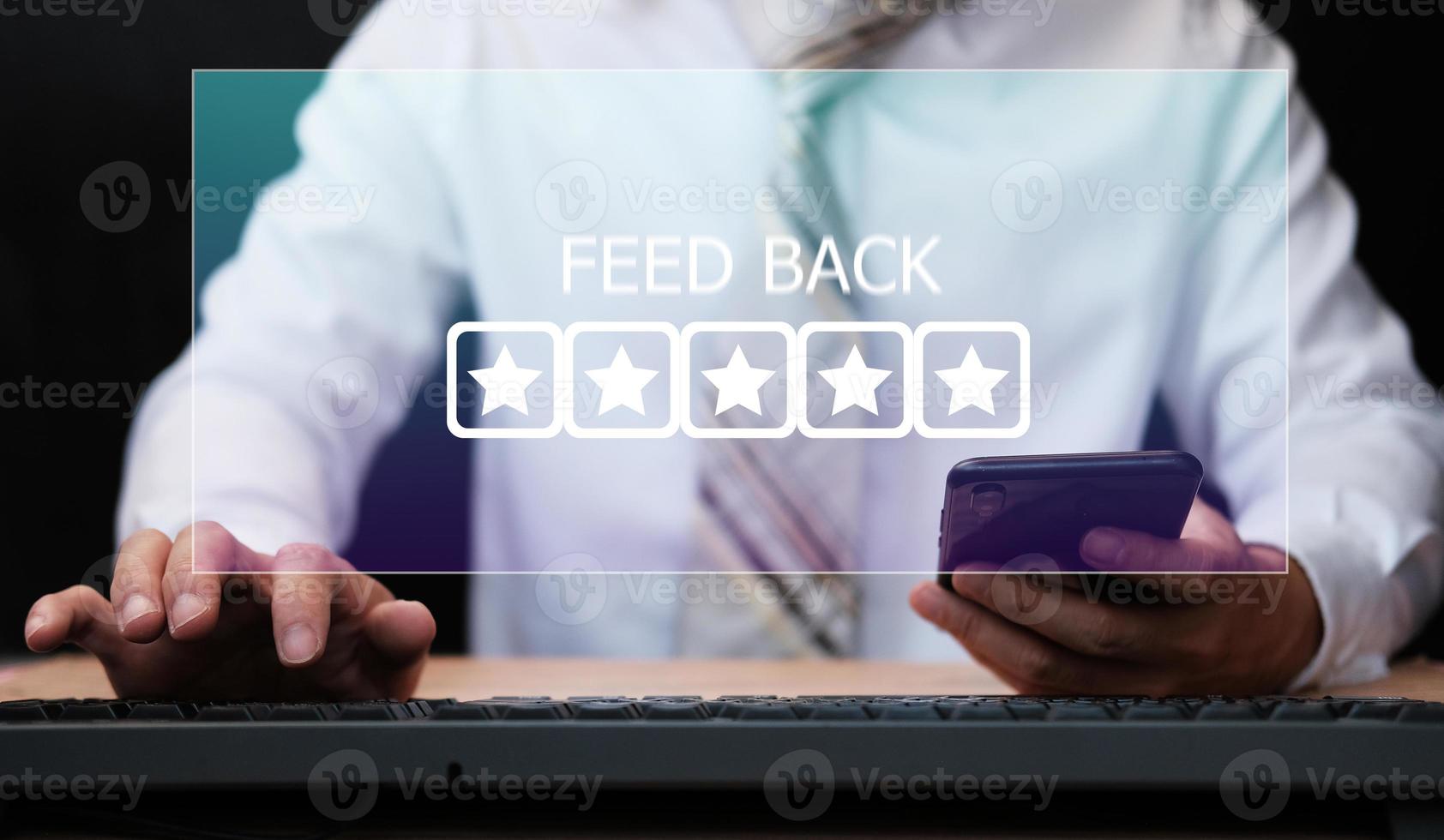 Writing review on internet with 5 star rating photo