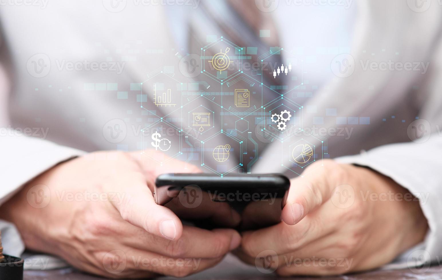 Businessman using smartphone and working data analytics process management with financial charts and graph and automated marketing dashboard photo