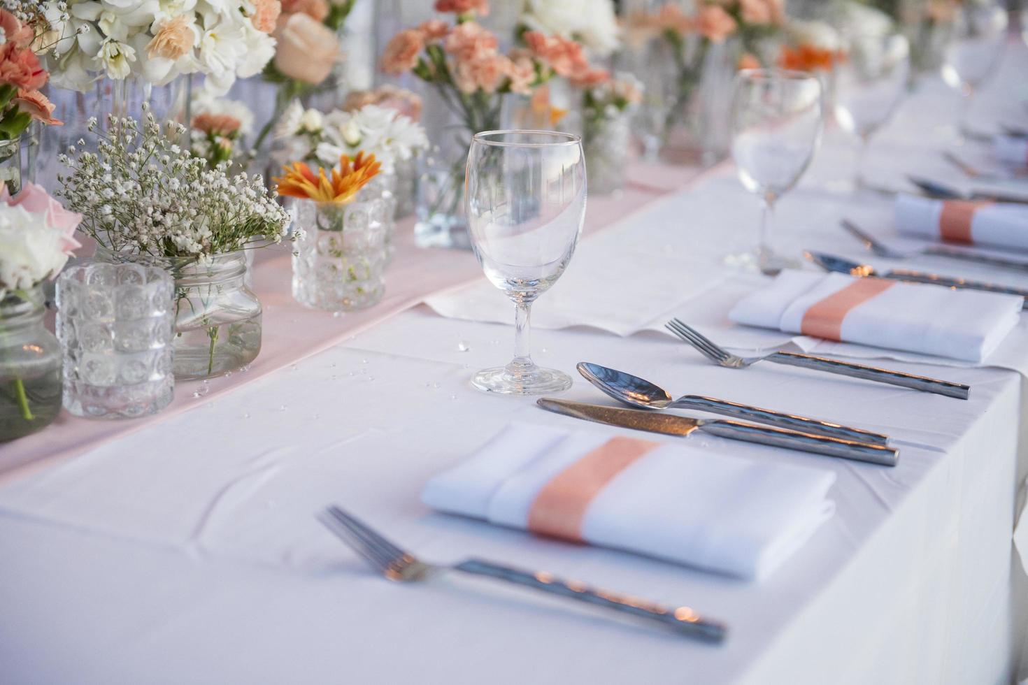 The elegant dinner table on the beach photo