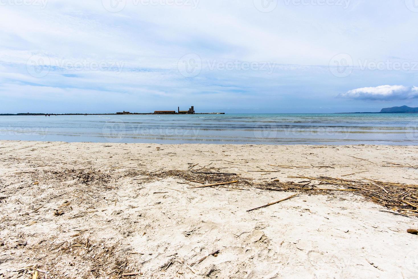 Old industrial buildings abandoned near the sea photo