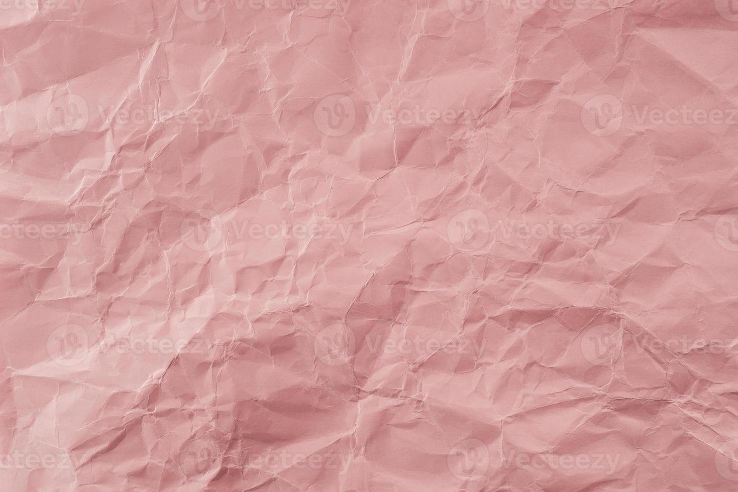 Crumpled Rose paper with soft texture. Simple background. photo