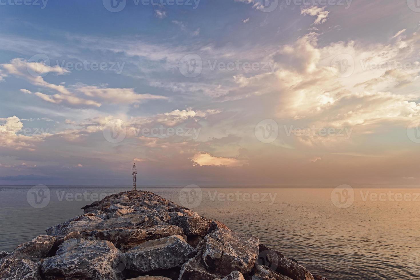 Sunset over the sea. Beautifull sunset over the Aegean sea, Peninsula Kassandra, Halkidiki, Greece. photo