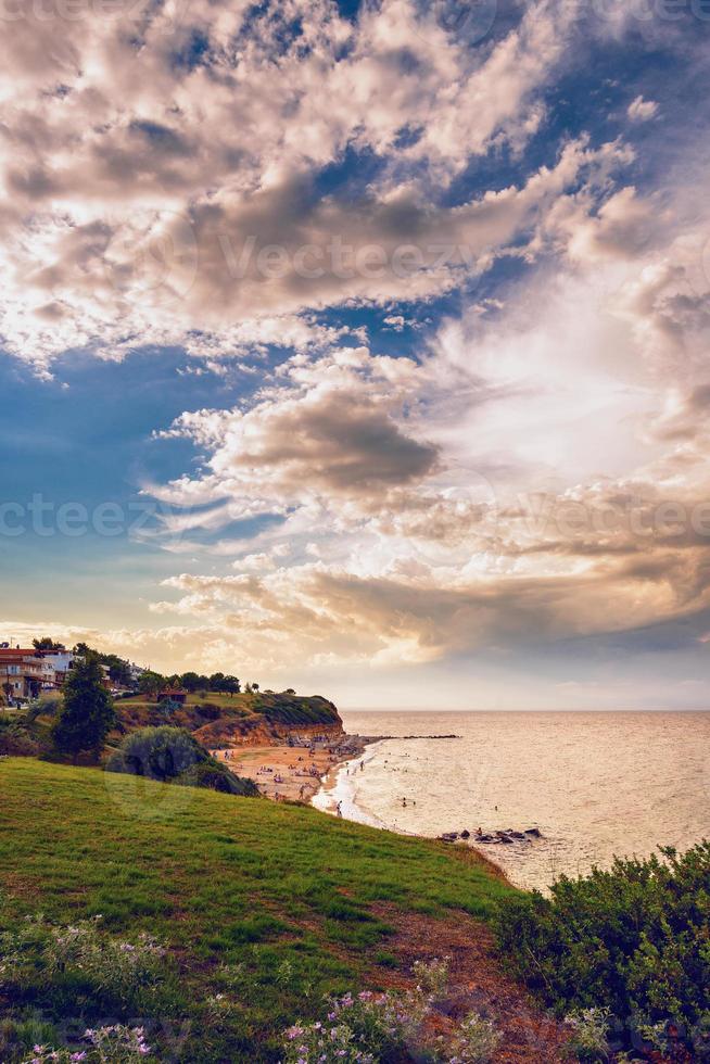 Coast and beach of Nea Fokea, tourist resort on Cassandra Chalkidiki peninsula in Greece. Low frequency of tourists, a quiet place to relax even in the center of the season. photo