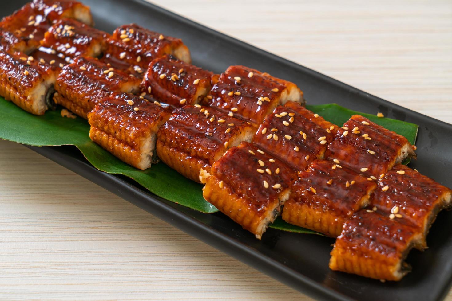 Sliced grilled eel or grilled unagi with sauce -Kabayaki - Japanese food style photo