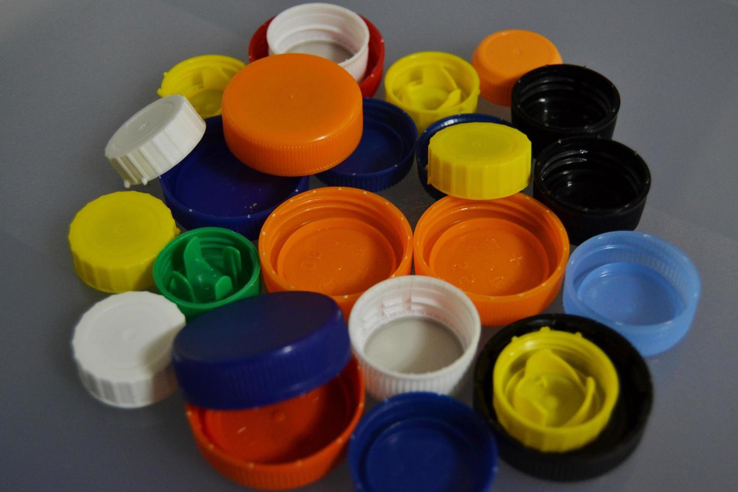 Plastic bottle stoppers of colors photo