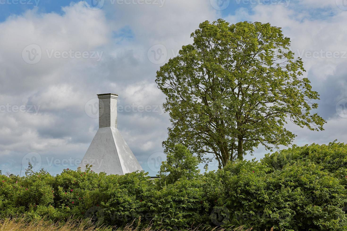 Smoke house typical for the small village of Svaneke on Bornholm island, Denmark photo