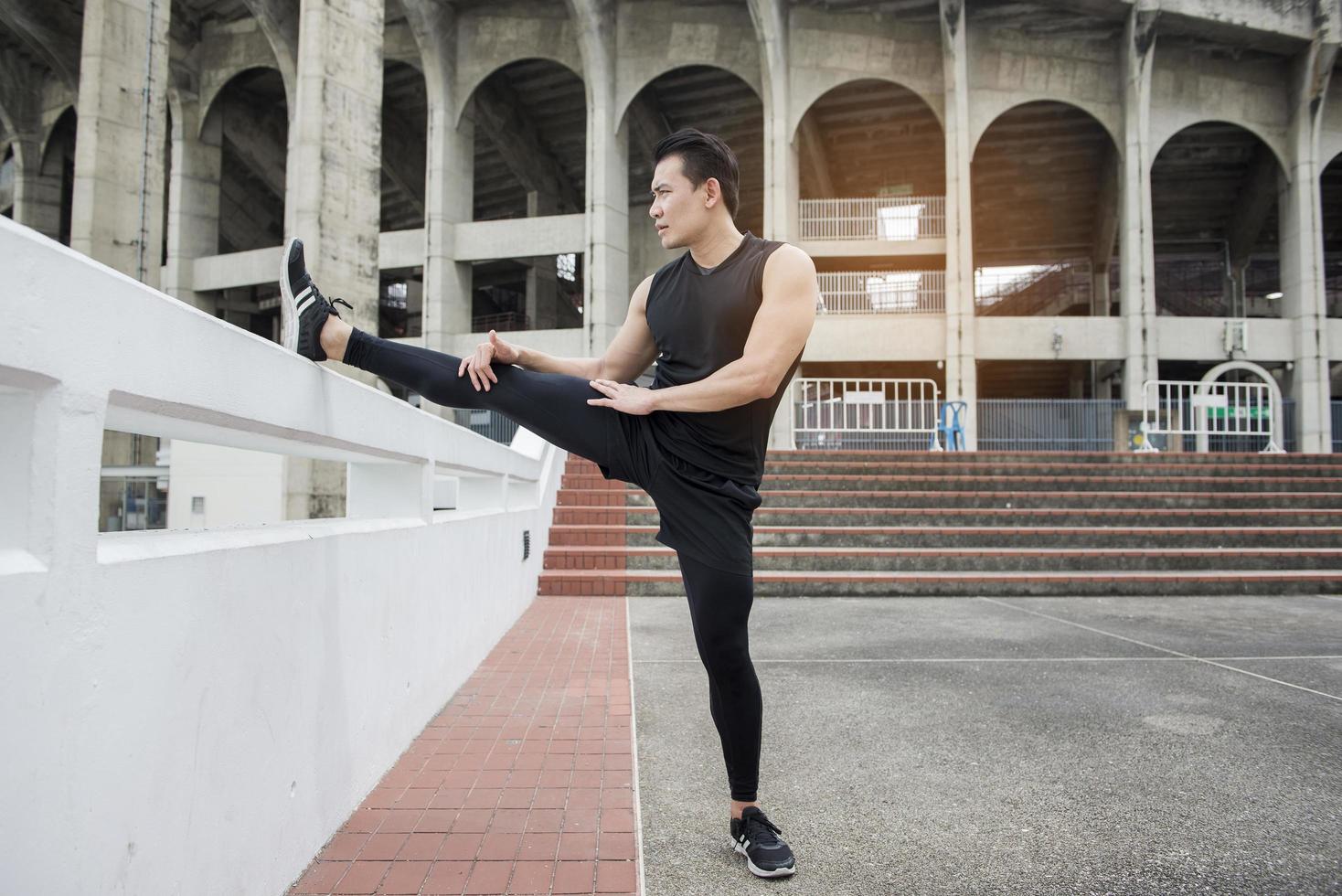 Handsome Sport man  exercising at outdoor city photo