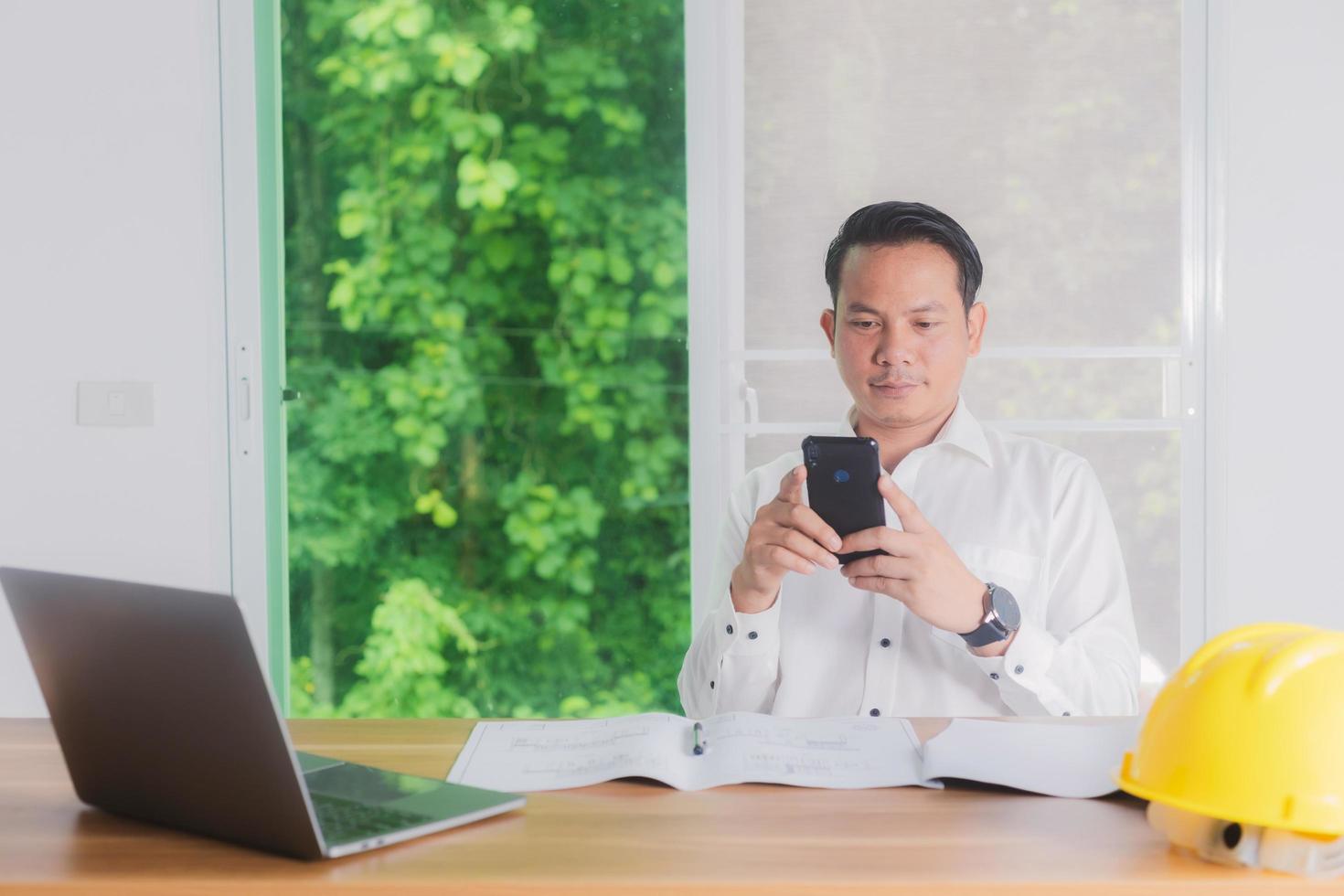 male engineer working in office photo