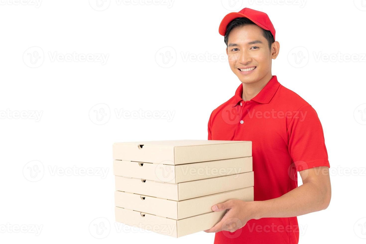 Delivery man employee in red t-shirt uniform face mask holding empty cardboard box photo