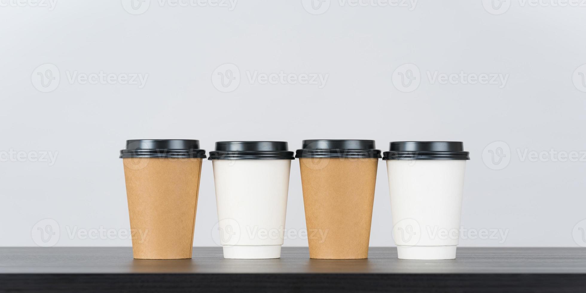 Blank paper coffee cup set on white background photo