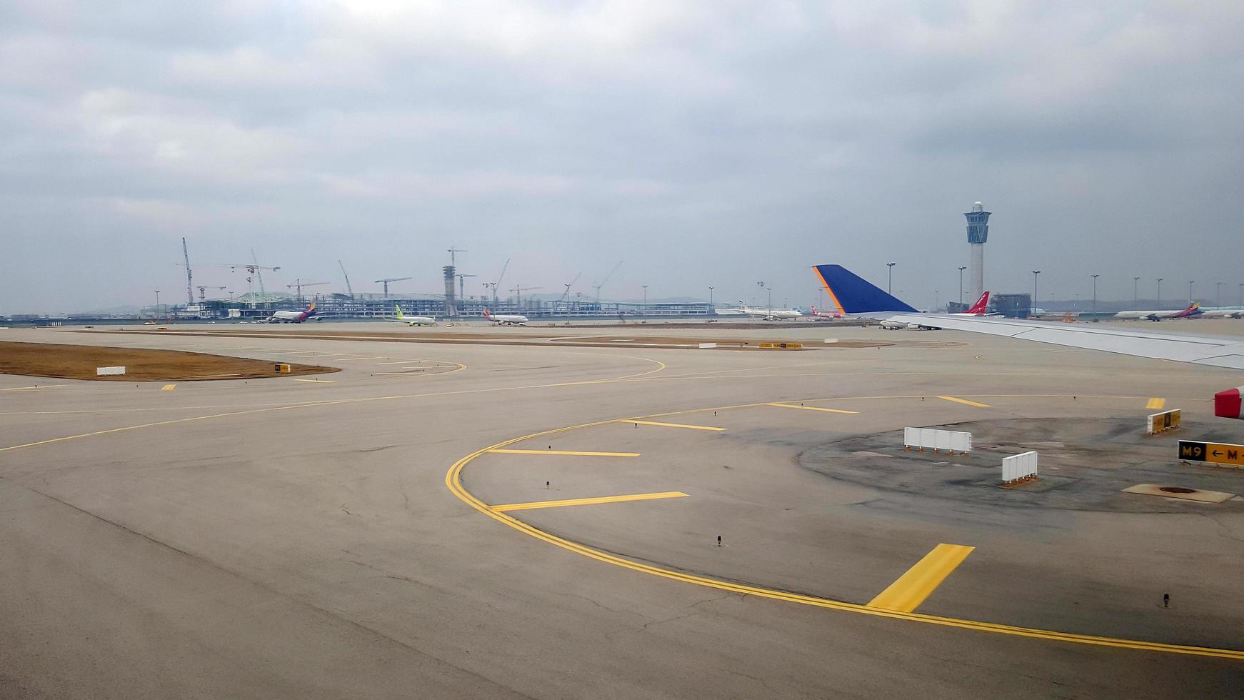 Seoul, Korea, Jan 02, 2016 - View of an airport through an airplane window photo