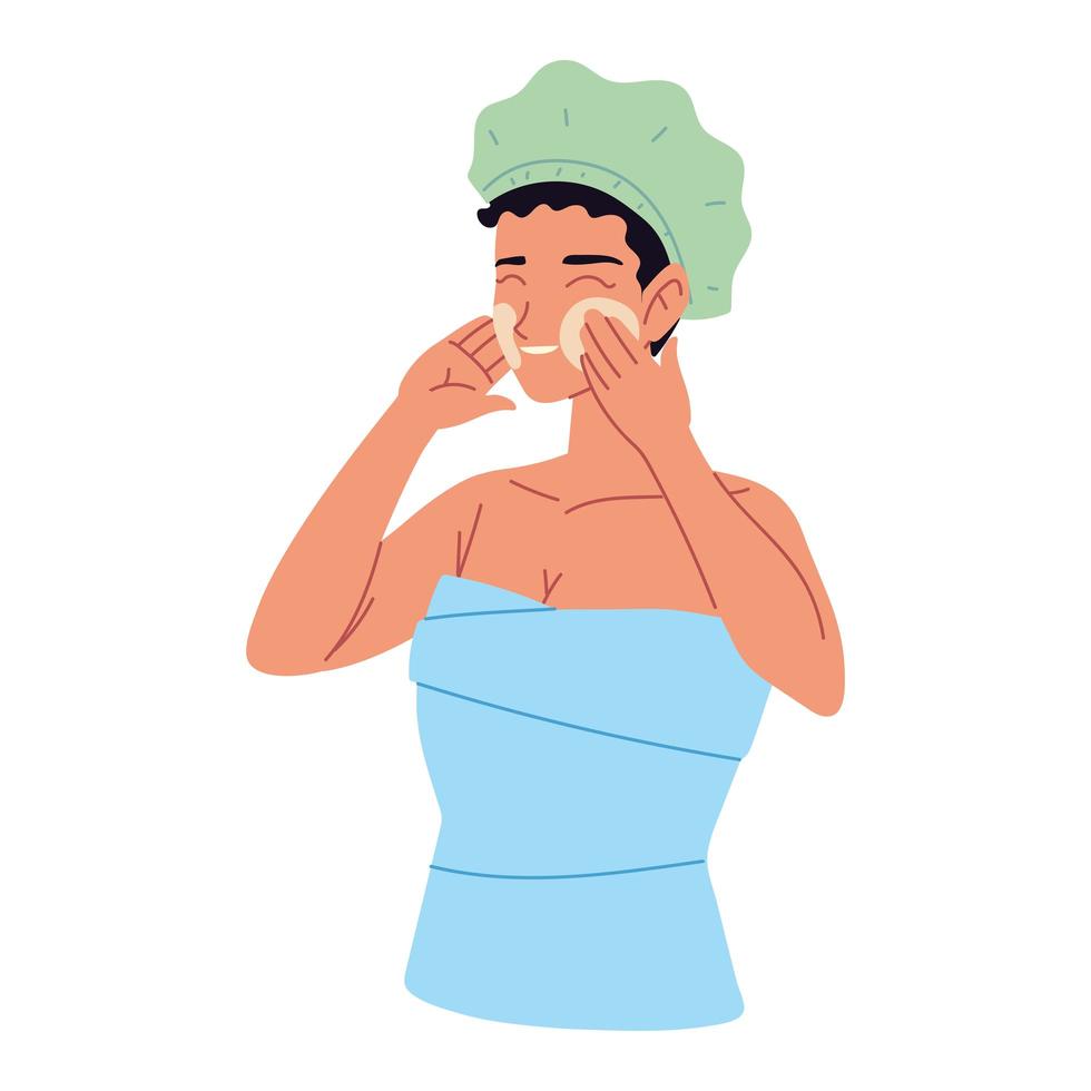 woman applies face cream, wrapped towel on washed hair vector