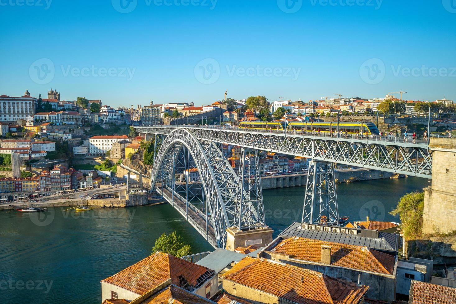 Cityscape of Porto in Portugal with Luiz I bridge photo