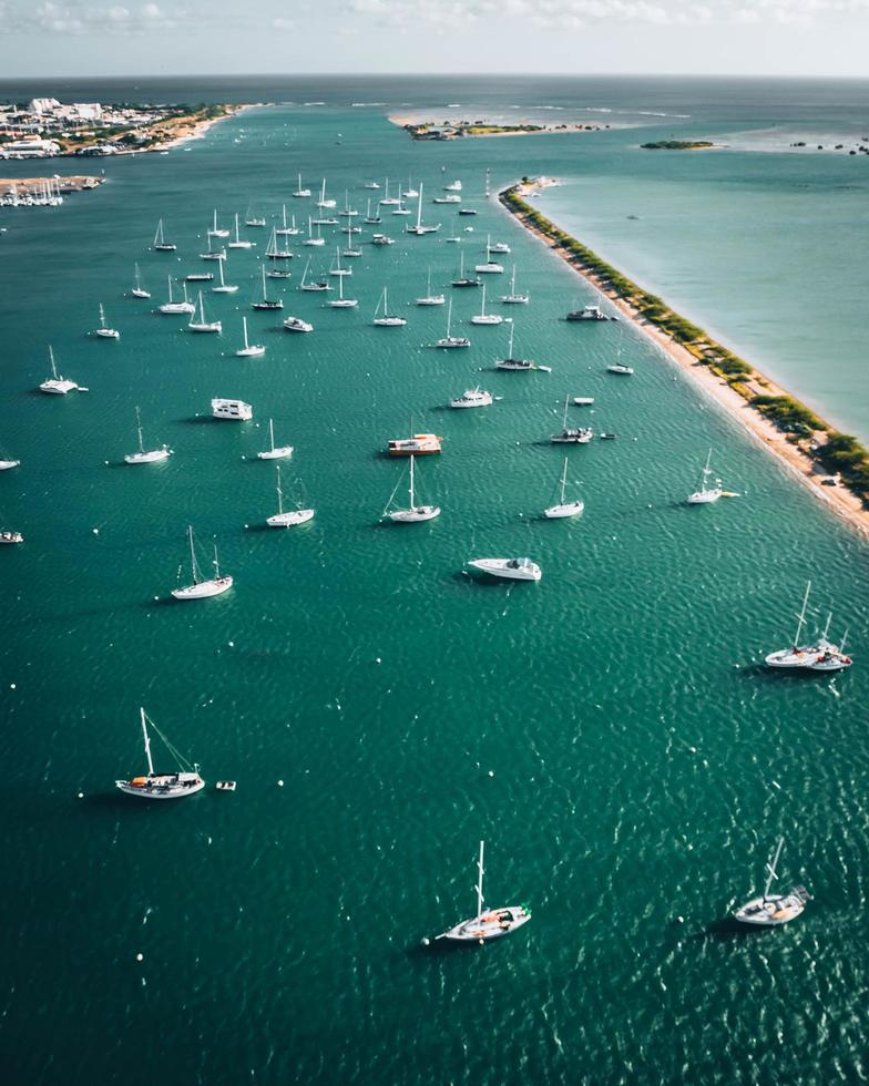 Helicopter aerial view of boats in the bay in Waikiki, Honolulu, Oahu, Hawaii photo