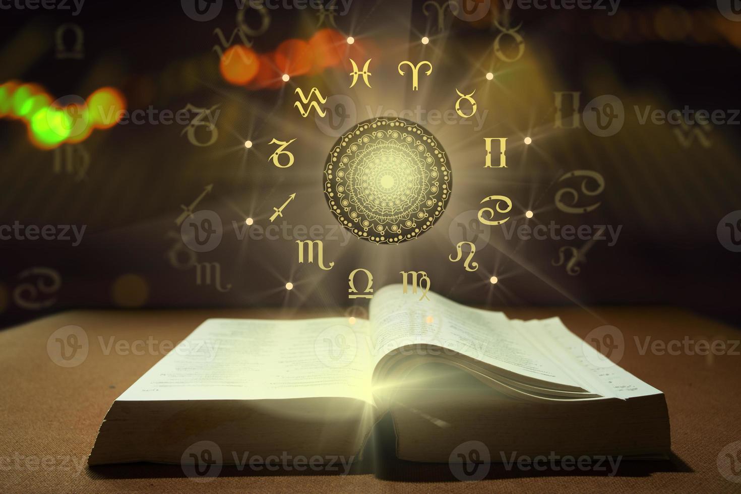 Book of Zodiac sign wheel of fortune photo