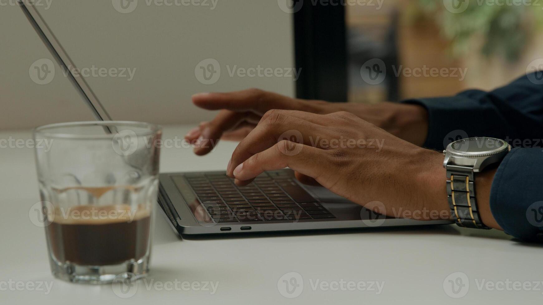 Young man working on laptop photo