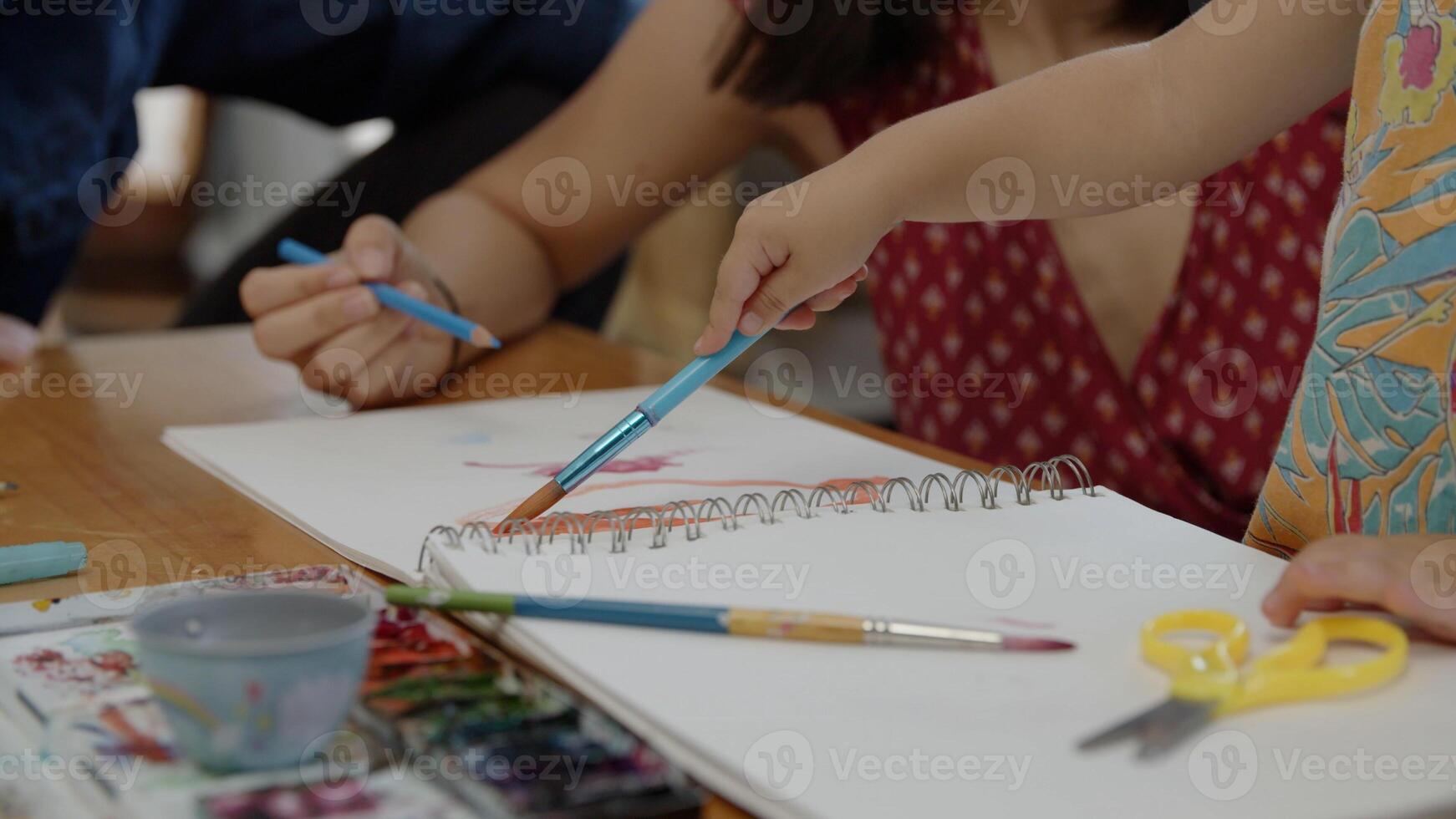 Portrait of girl painting picture photo