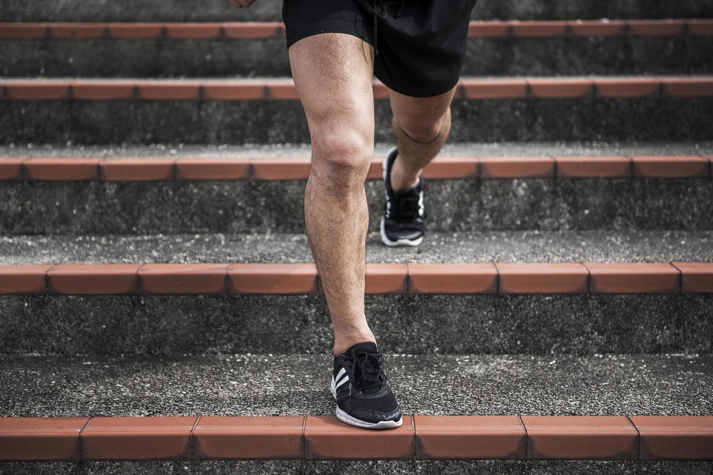 Close up sport man  exercising at outdoor city photo