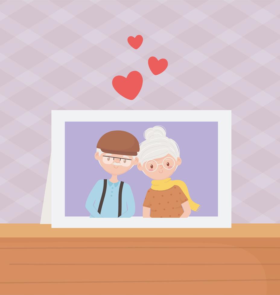 ancianos, linda pareja abuelos marco de fotos en la mesa 2657092 Vector en  Vecteezy