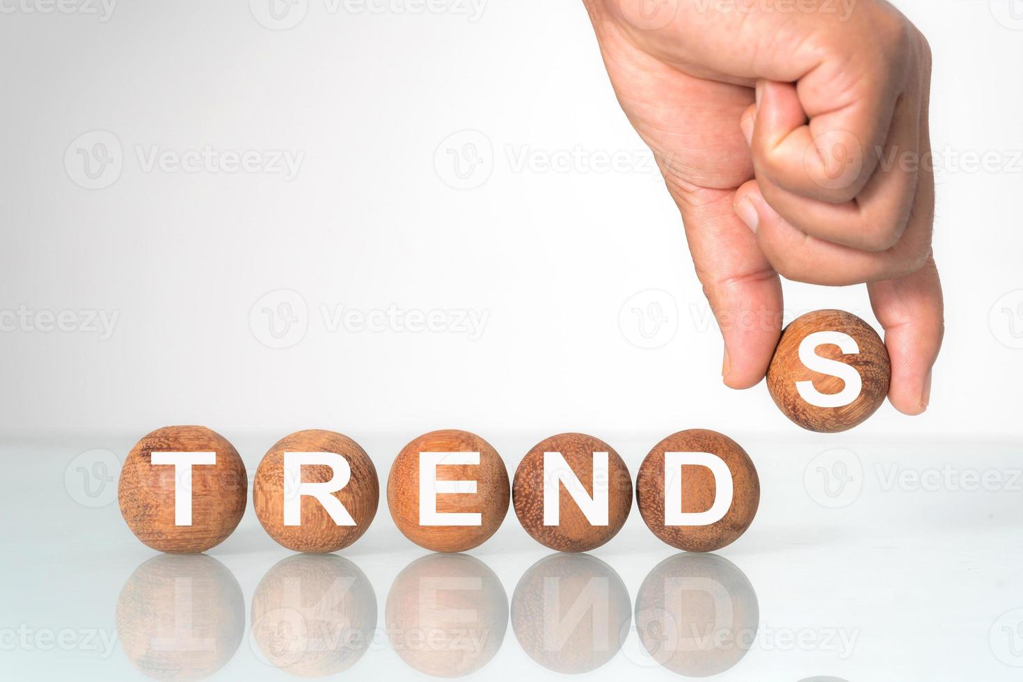 Wooden ball with word TRENDS concept photo