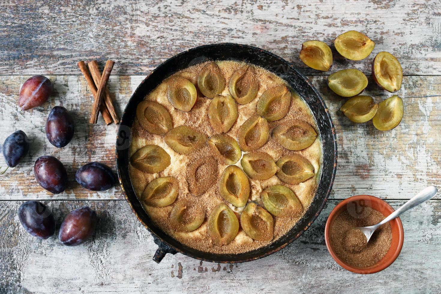 Homemade plum pie Cooking plum cake photo