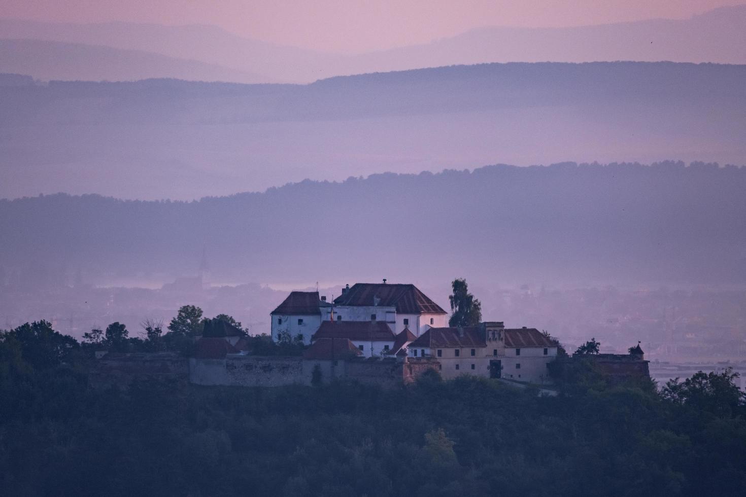 Landscape with old buildings in Romania photo