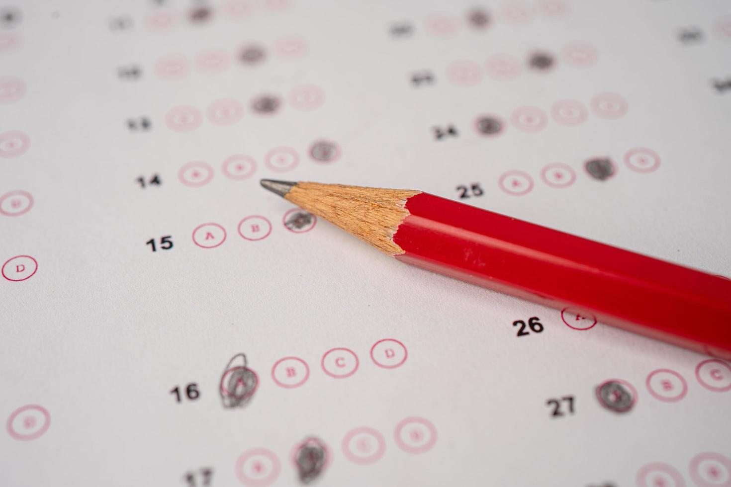 Answer sheets with pencil drawing fill to select choice, education concept photo