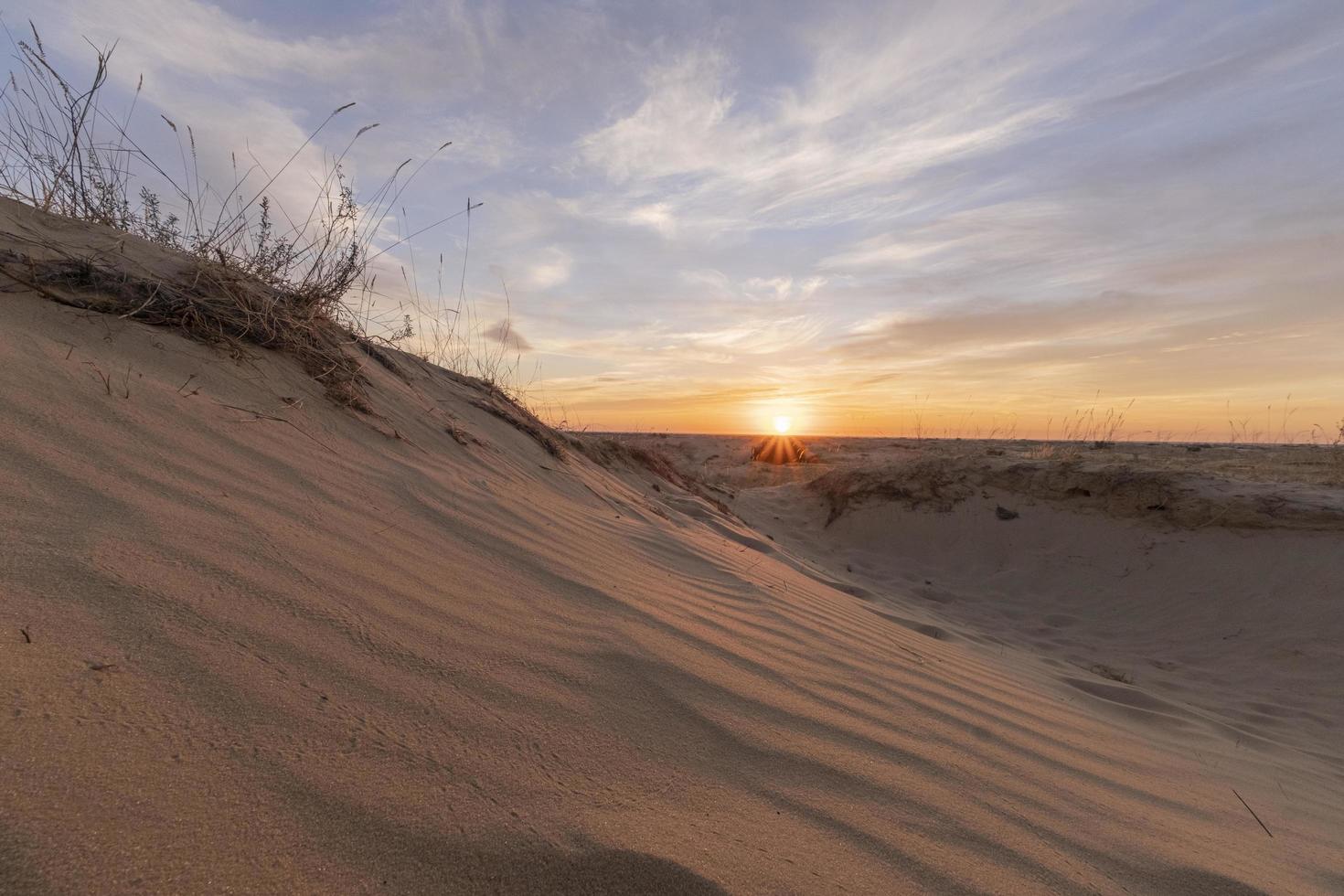 Landscape with sunset in the desert photo