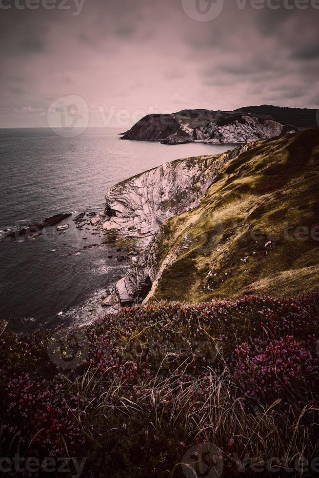 cliff and sea in the coast in Bilbao, Spain photo