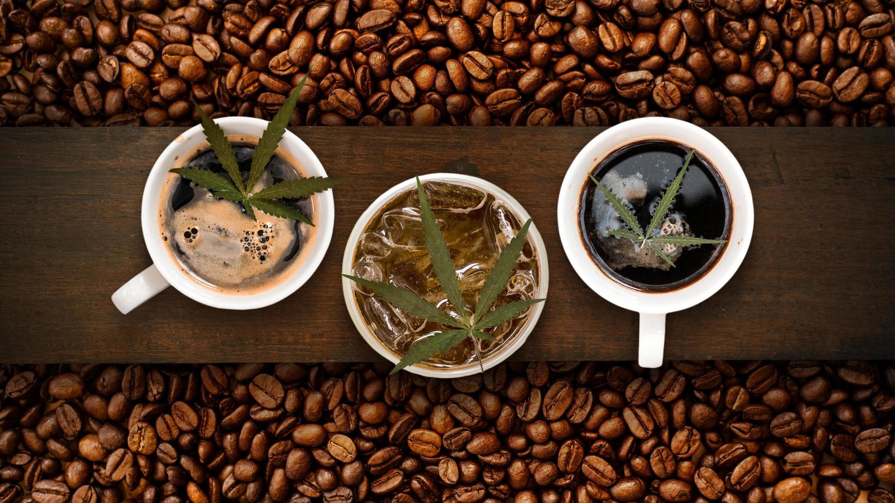 cannabis coffee with coffee beans on table on the table photo