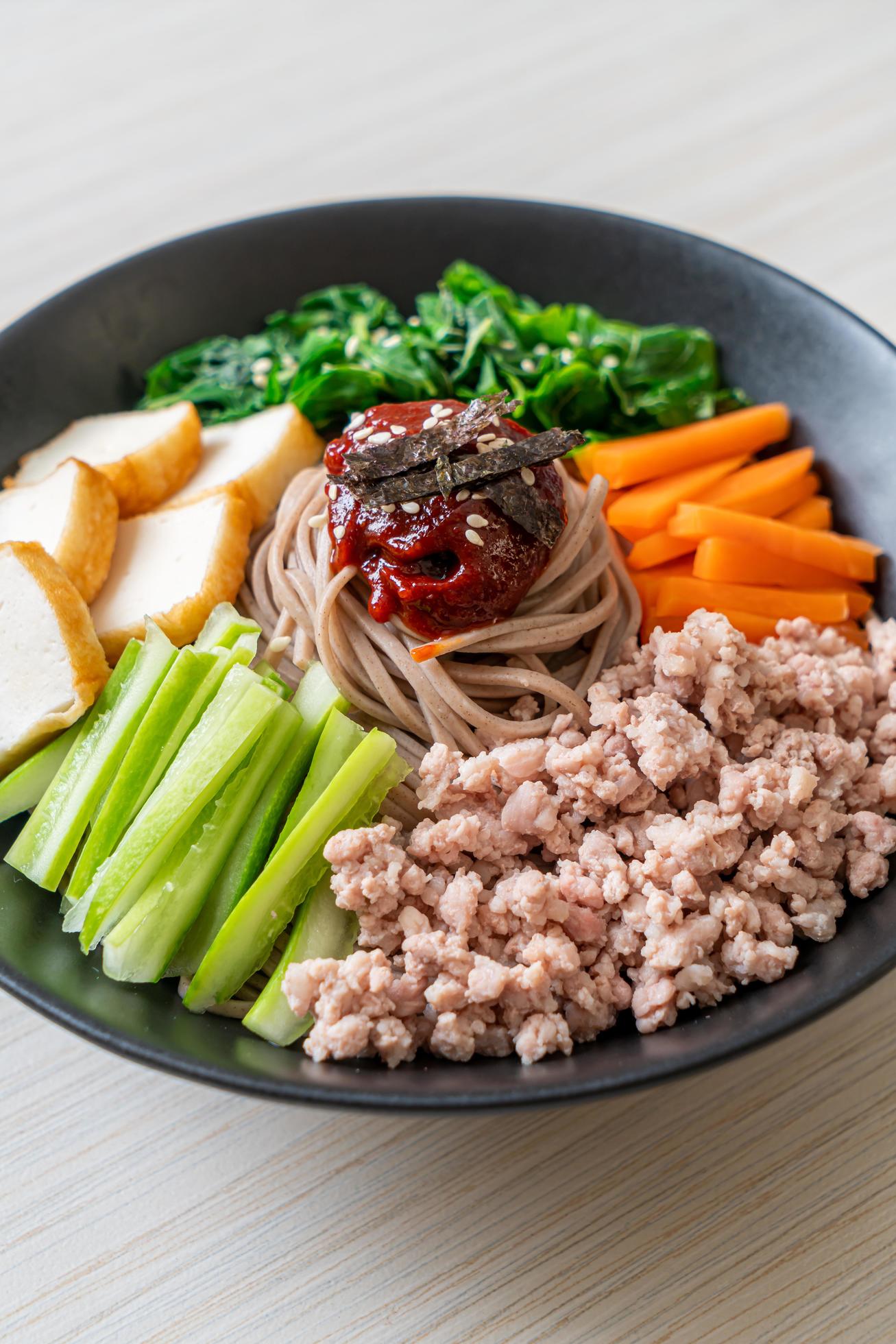 Korean spicy cold noodles 2673802 Stock Photo at Vecteezy