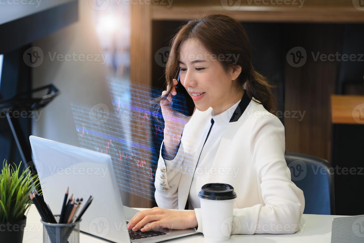 Business woman using computer laptop photo