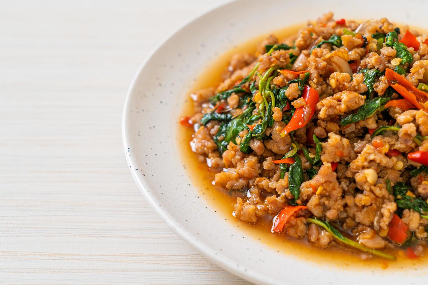 Stir fried Thai basil with minced pork photo