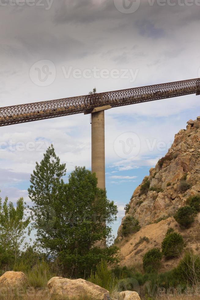 Kilometre-long conveyor belt for transporting stones from the quarry to the plant photo