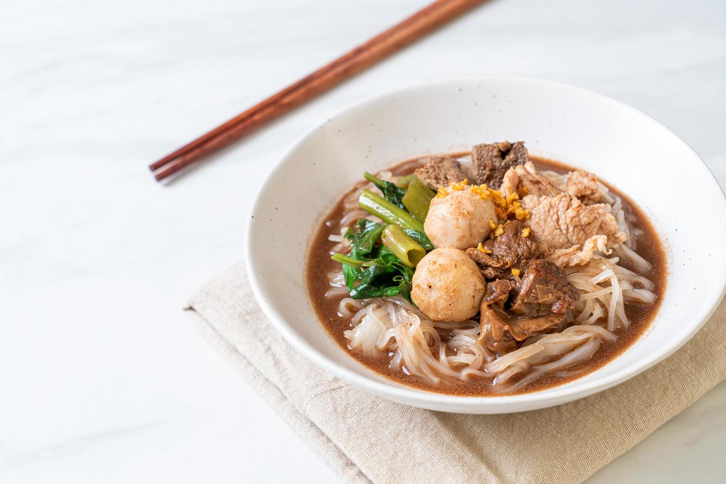 Rice noodle soup with Stewed pork photo