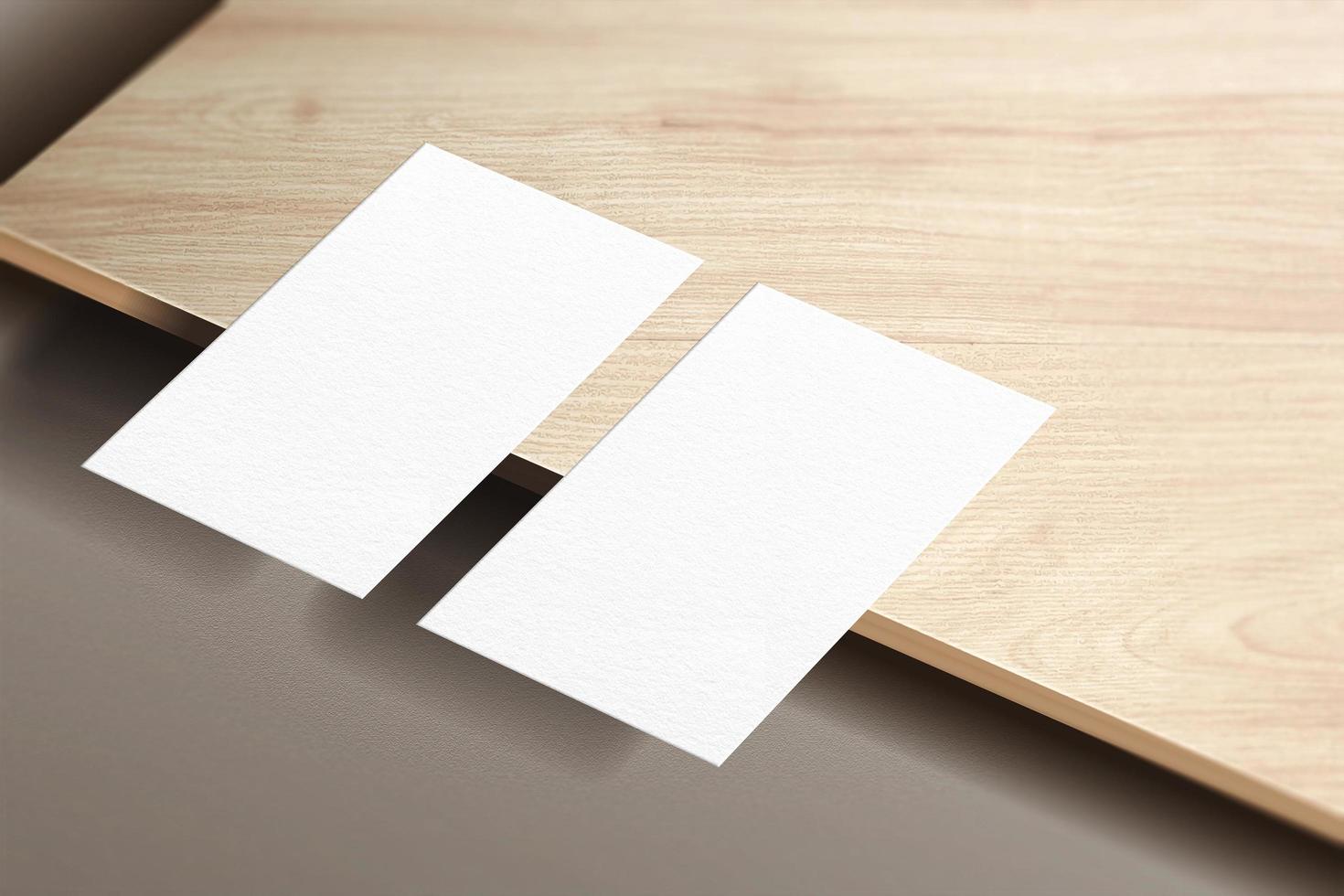 Minimalist business card mockup isolated on wooden plat background. photo