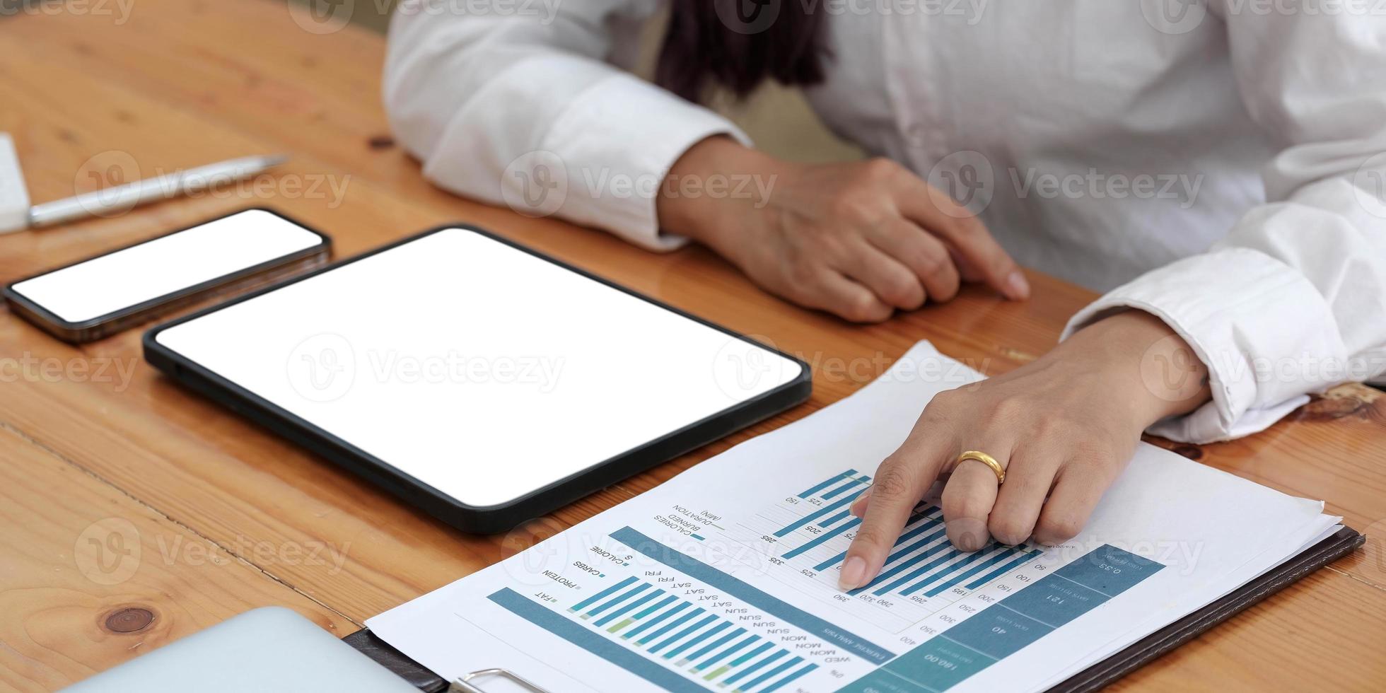 computer screen blank mockup.hand woman work using laptop with white background for advertising,contact business search information on desk at coffee shop.marketing and creative design photo