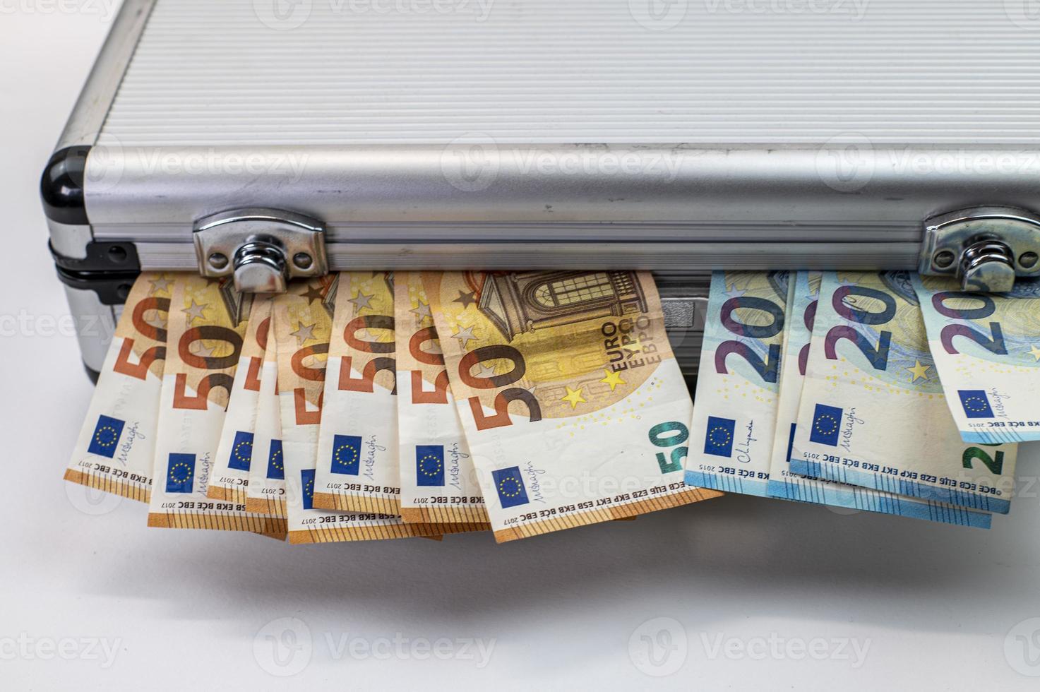 50 and 20 euro banknotes on aluminum case photo