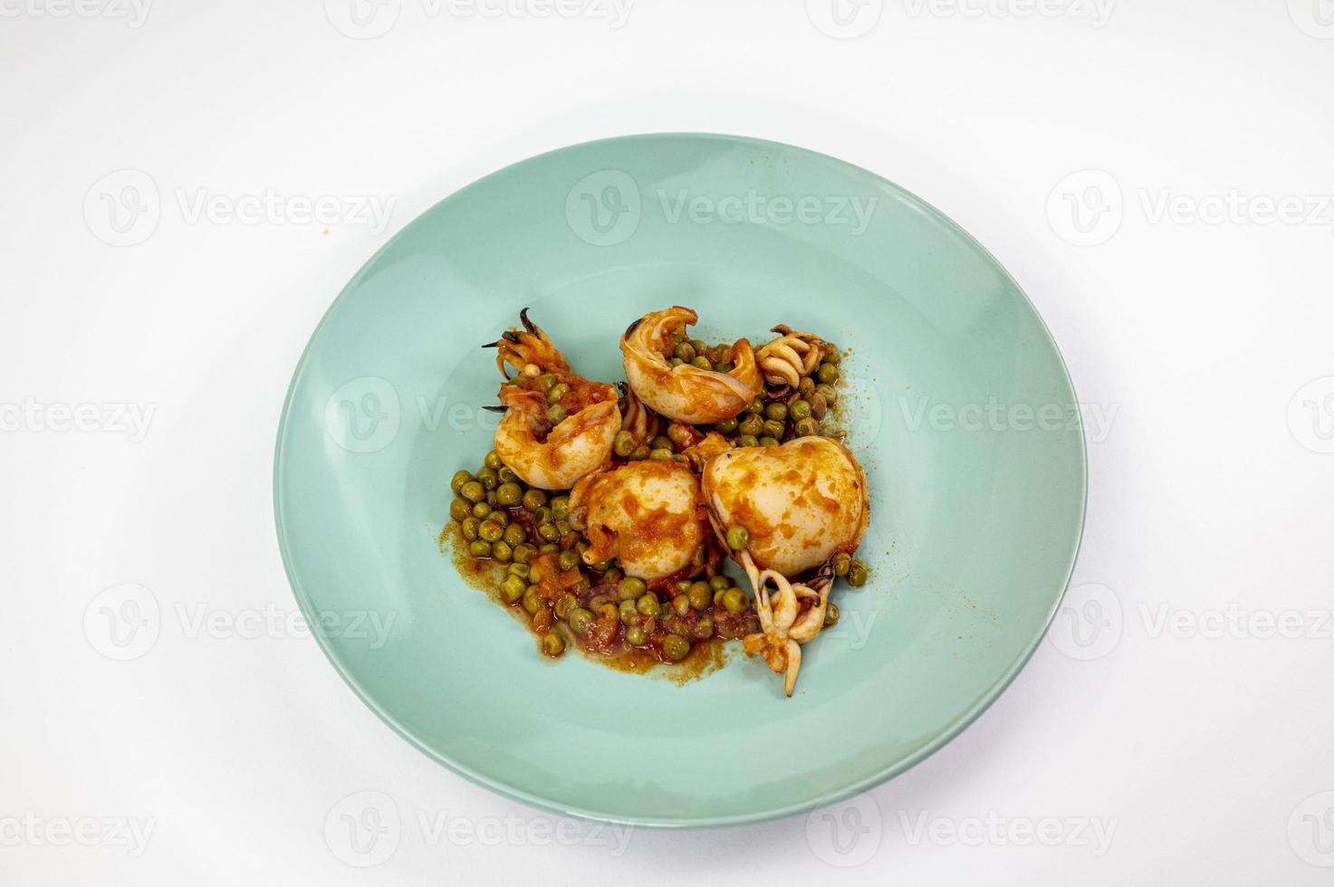 second course with cuttlefish and tomato peas photo