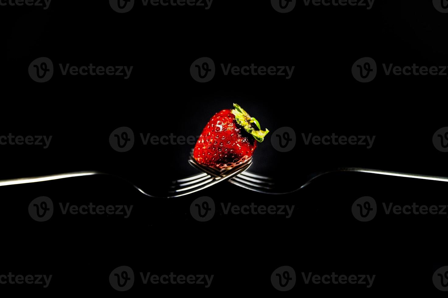 composition with strawberry and forks photo