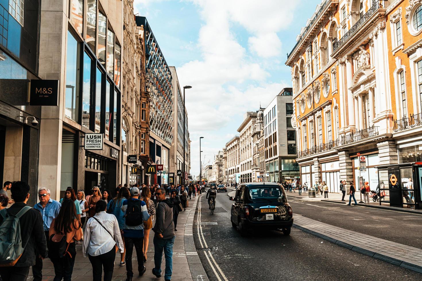 London, England -2 SEP 2019 - The famous Oxford Circus with Oxford Street and Regent Street on a busy day photo