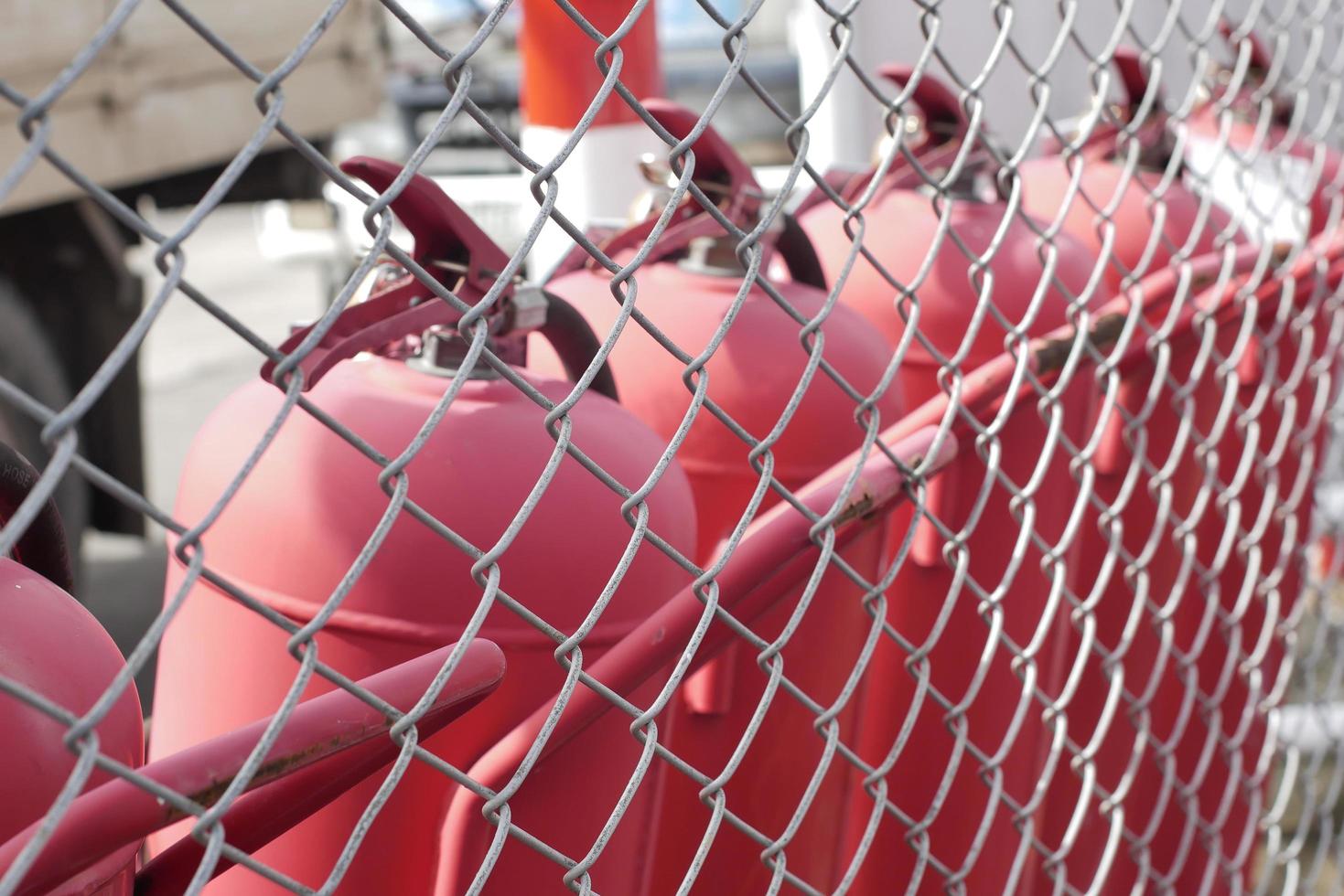 Red fire extinguisher ready to use photo