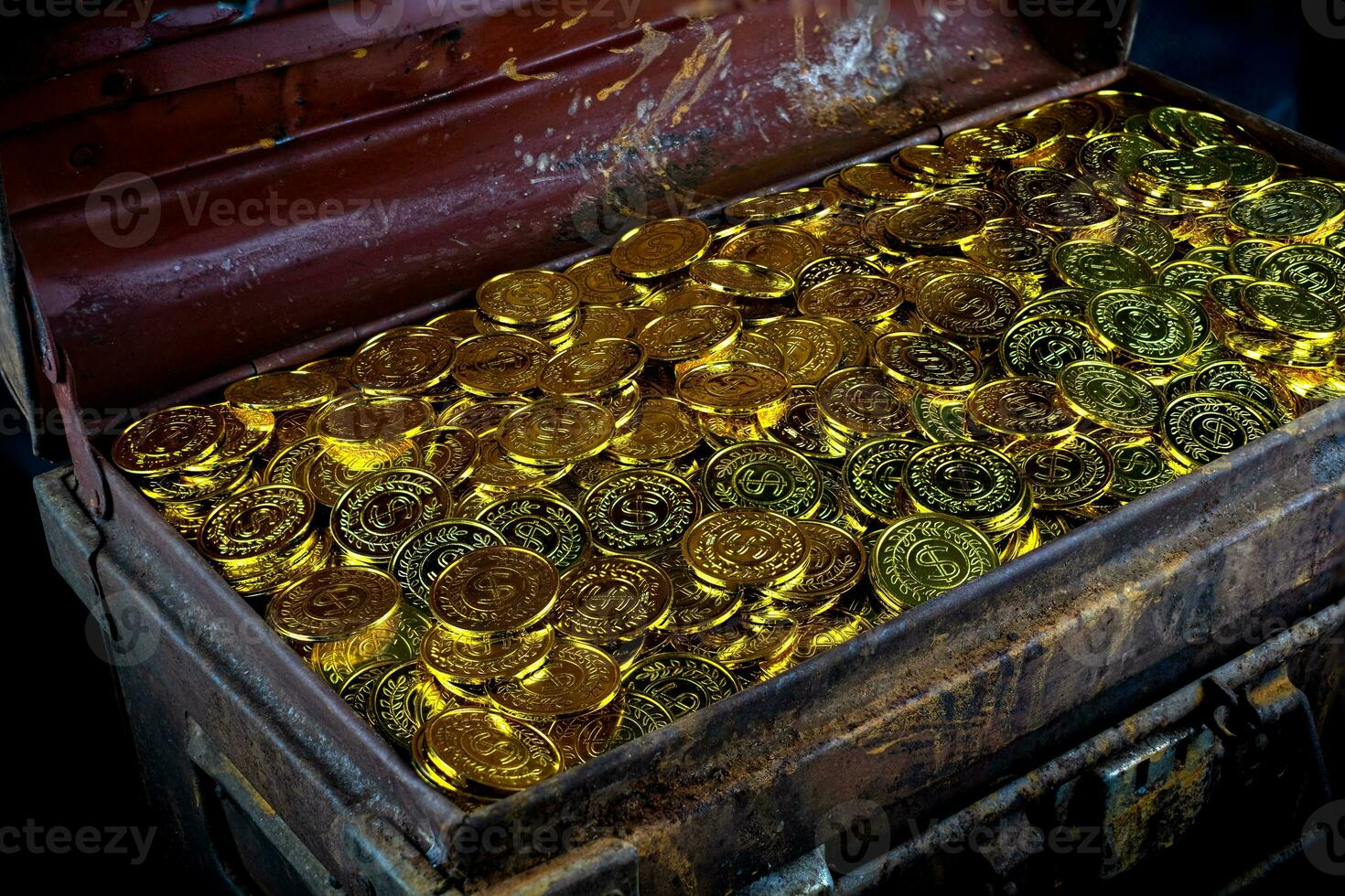 Stacking Gold Coin in treasure chest photo