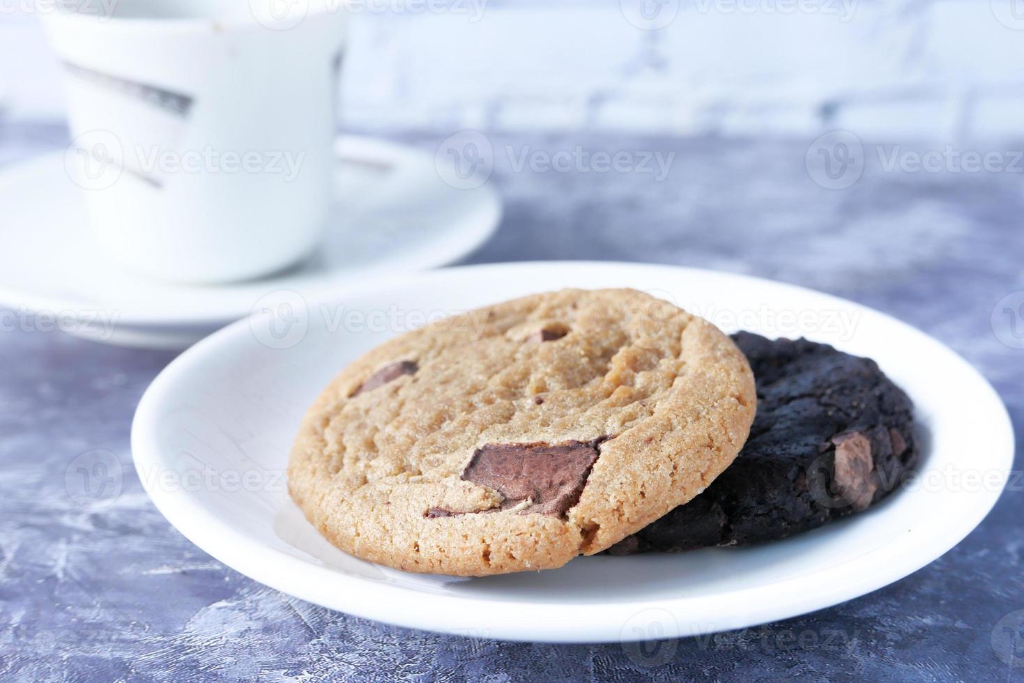 Close up of cookies and tea on table photo