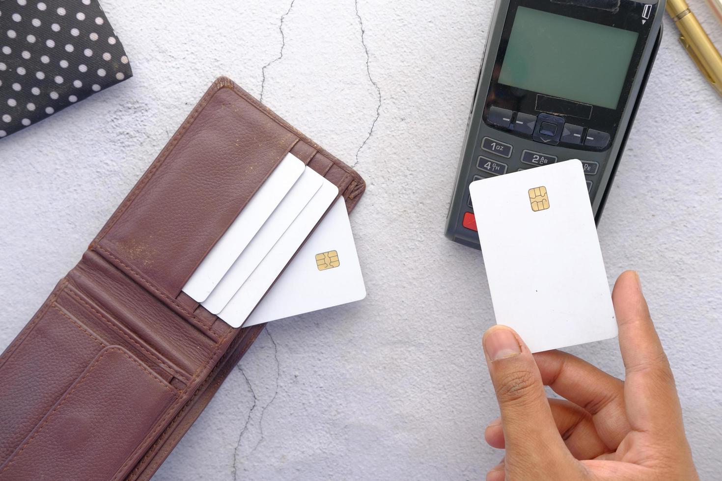 Contactless payment concept with young man paying with credit card photo