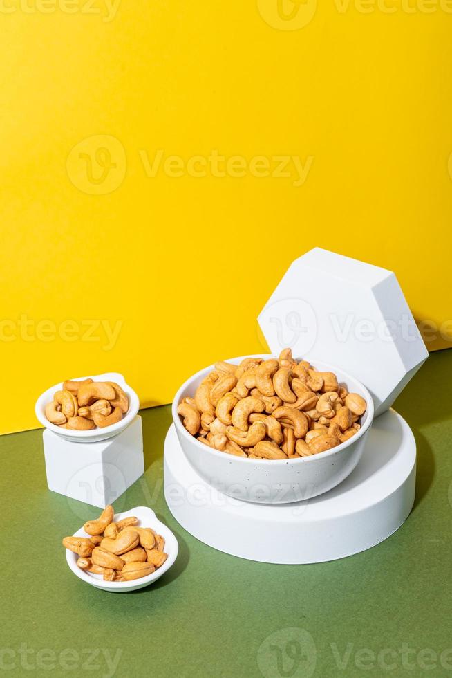 Cashew nuts in wooden bowl photo