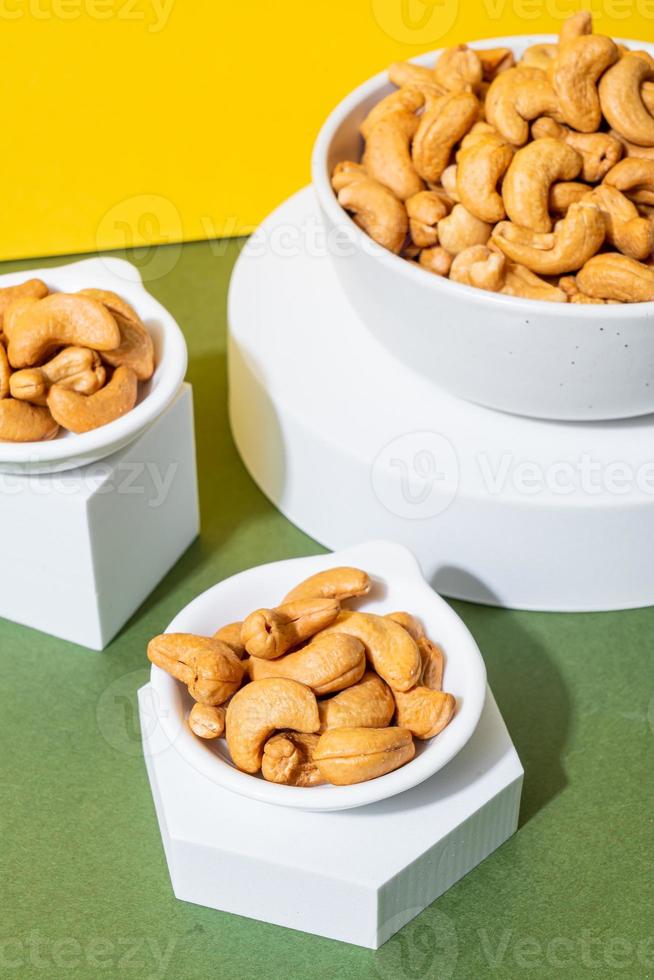 Cashew nuts in wooden bowl photo