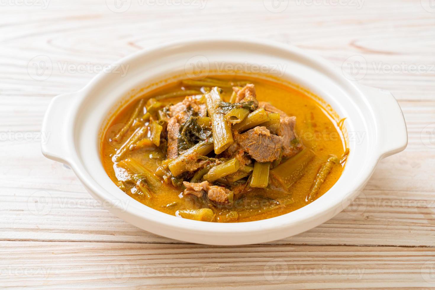 Thai pork curry with morning glory photo