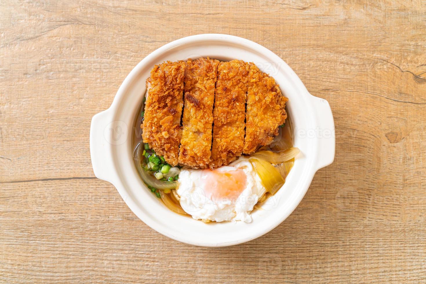Japanese fried pork cutlet with onion soup and egg photo