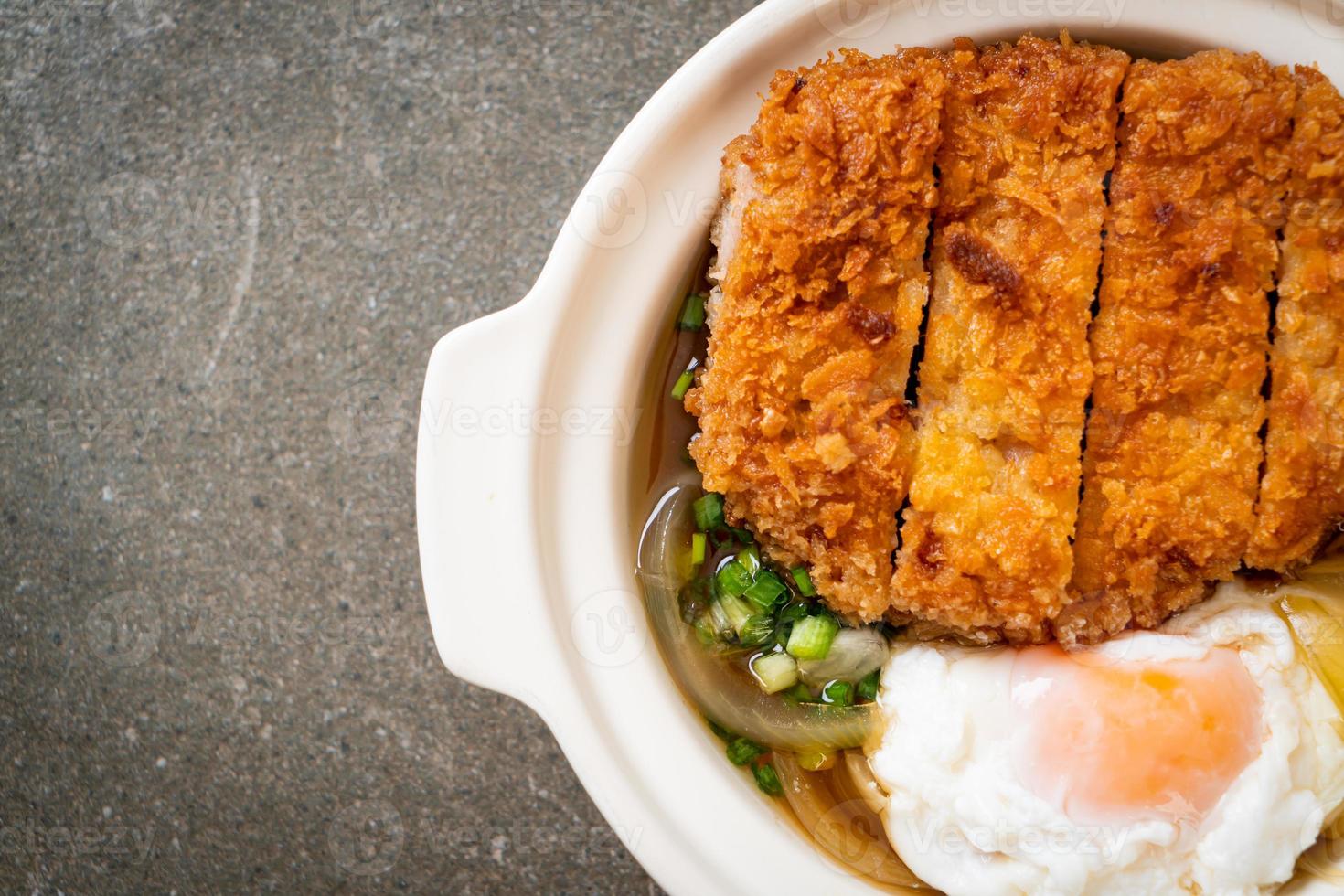 Japanese fried pork cutlet with onion soup and egg photo